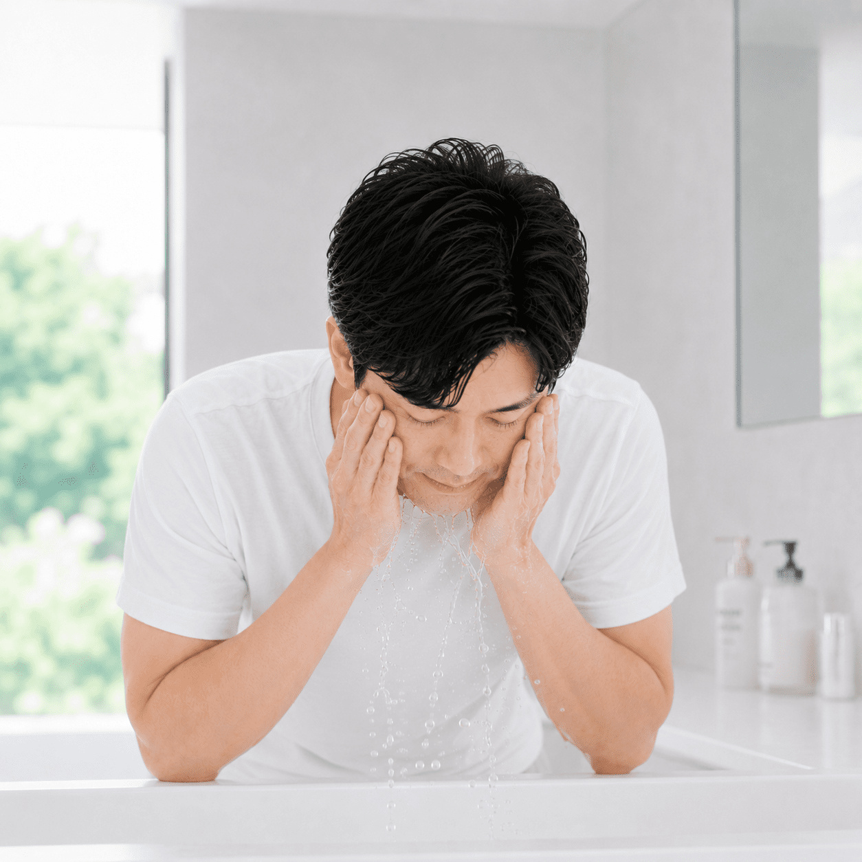 顔を濡らすステップの写真