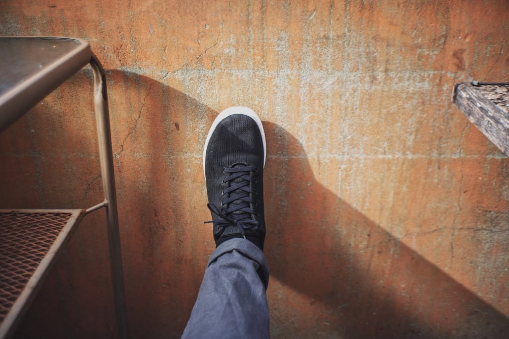 靴を履いた男性