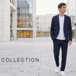 AUTUMN COLLECTION 2026。ネイビーのCODEジャケットとCODEイージーパンツに、白のCODEロングスリーブTシャツを合わせて歩く男性